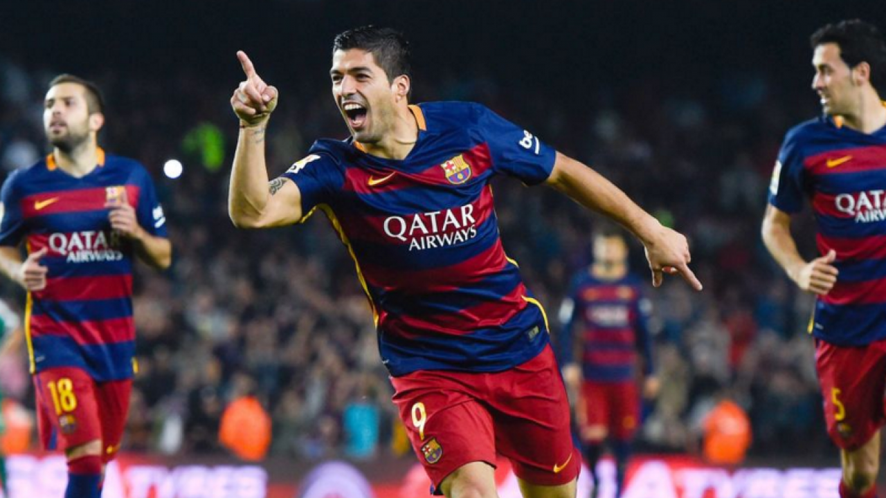 Luis Suarez celebrates his first goal for Barcelona 