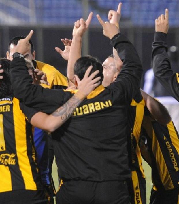 Marcelo Palau and his teammates celebrate his sensational goal. 