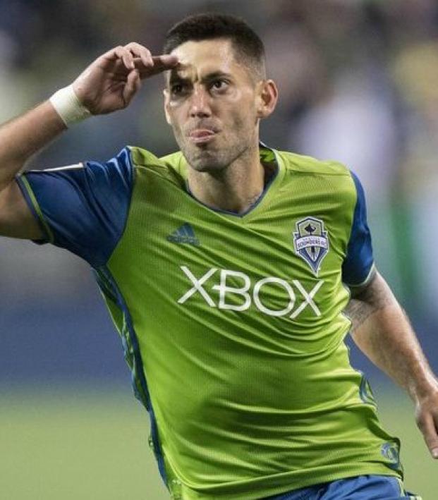 Clint Dempsey salutes the crowd as he scores for the Seattle Sounders. 