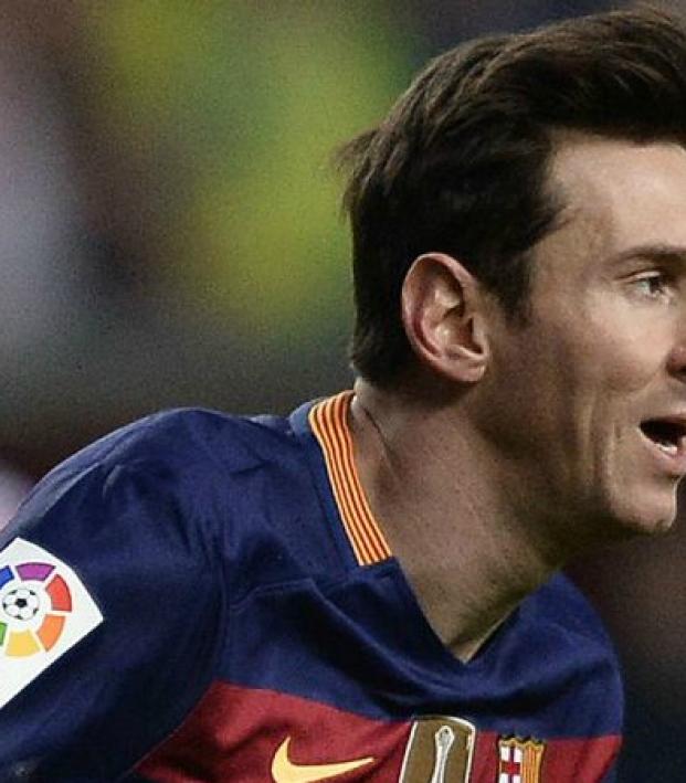 Lionel Messi celebrates his hat trick against Rayo Vallecano. 