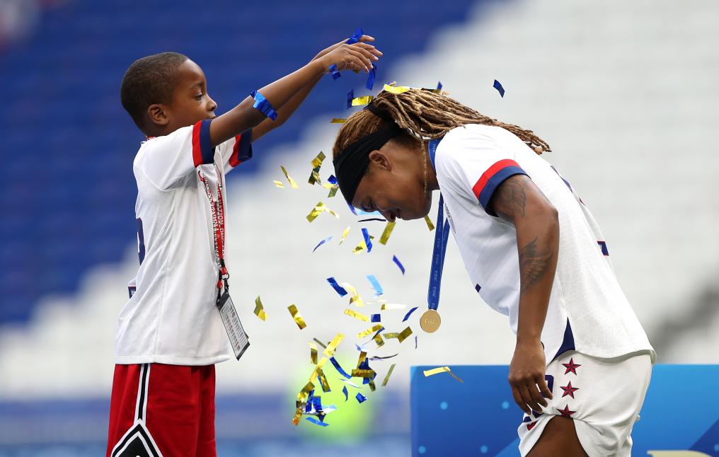 Jessica McDonald and son celebrate World Cup victory