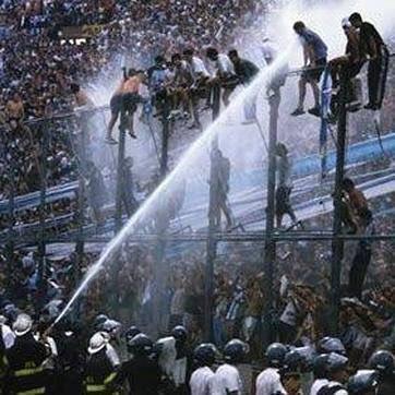 Police use hose on supporters