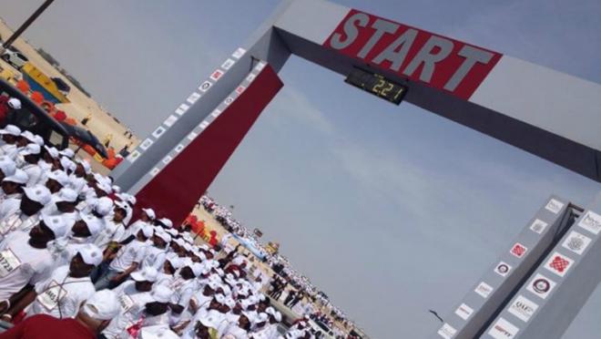 Qatar Workers Line Up To Run A Shoeless Marathon