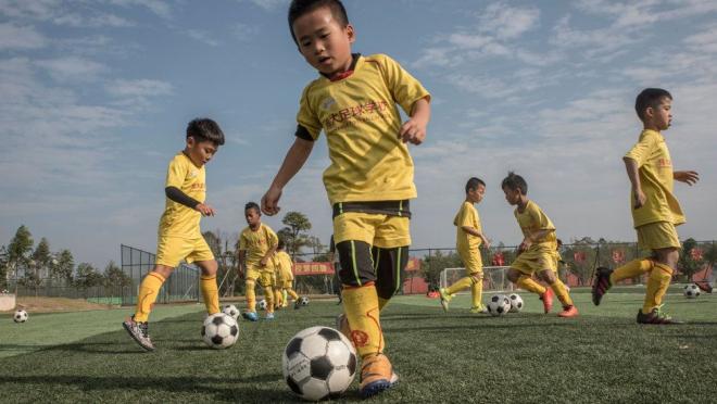 Chinese schools will receive new football pitches and training facilities.