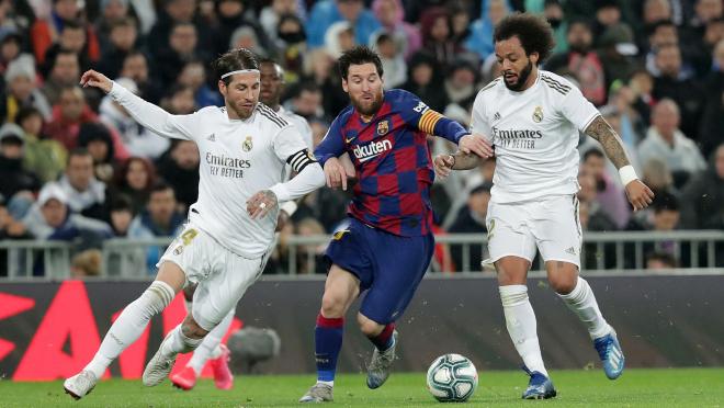 Messi fends off challenges from Real Madrid defenders