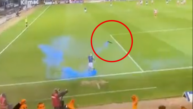 Scottish Footballer Kicks Flare At Fans