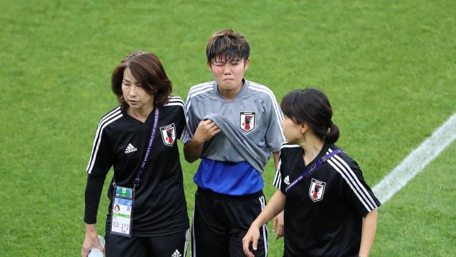 Japanese player hit in face by ball