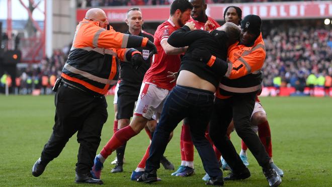 Leicester City fan attacks Forest players