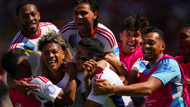 Jhonder Cadiz of Venezuela celebrates with teammates after scoring against Ecuador in 2024 Copa América