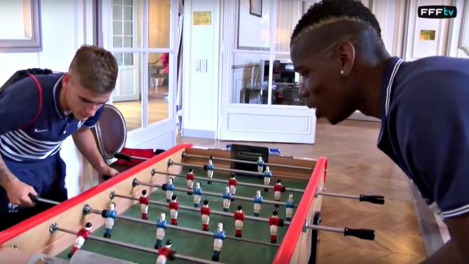 Paul Pogba and Antoine Griezmann play foosball