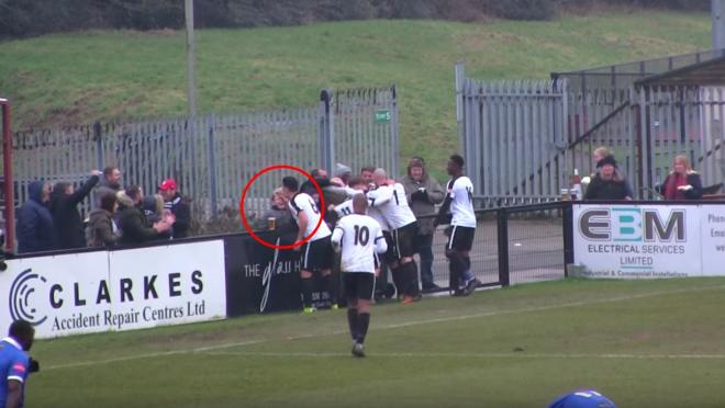 Colby Town player drinks a beer