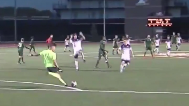 Goalkeeper kicks ball off opponents face 