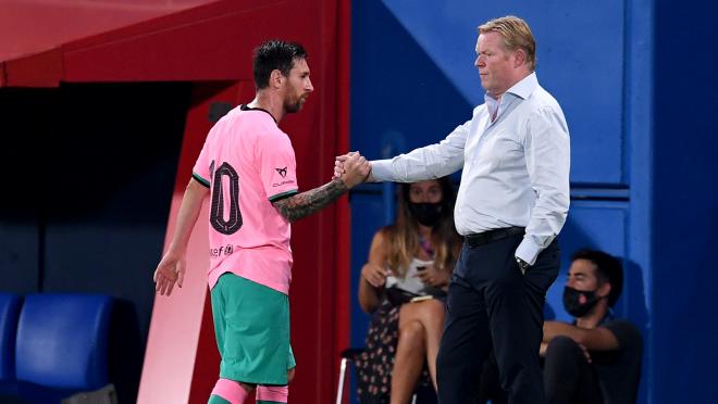 Messi shakes hands with Barcelona manager Ronald Koeman