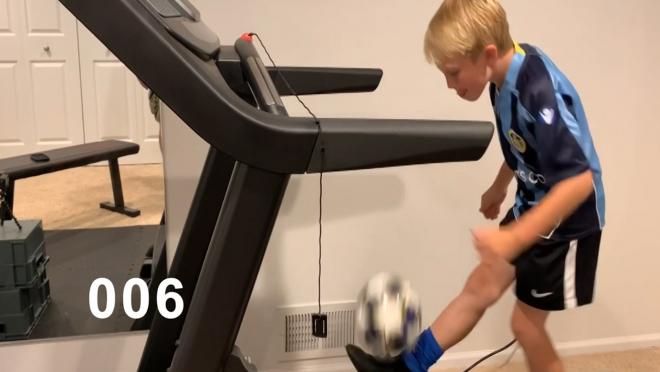 Kid practices soccer on treadmill