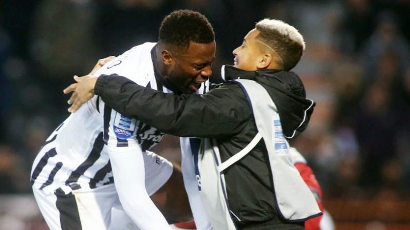 Fernando Varela celebrates with son