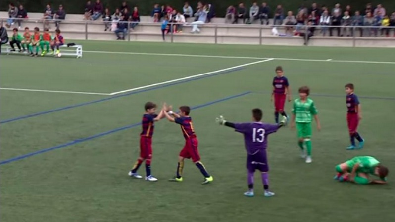 Watch these youngsters tear up an entire defense at Barelona's training academy, La Masia. 