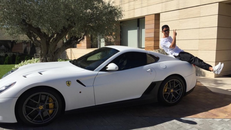 Messi vs Ronaldo: they both sure do have some nice cars. 