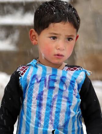 Murtaza Ahmadi in a Lionel Messi plastic bag jersey